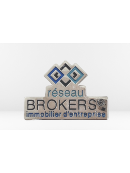 Pin's aimanté publicitaire...